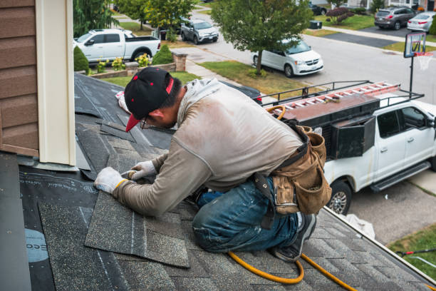 Professional Roof Replacement technician working in Red Hill, PA